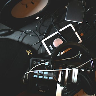 Samplers, keys and cables on a bench
